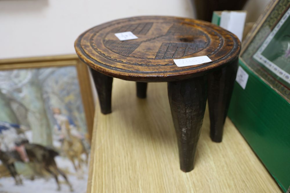 A Nigerian tribal stool, diameter 30cm height 20cm